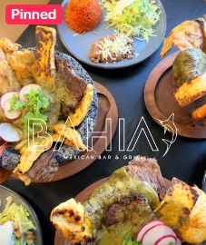 Mexican plates with rice, vegetables and garnishes at Bahía